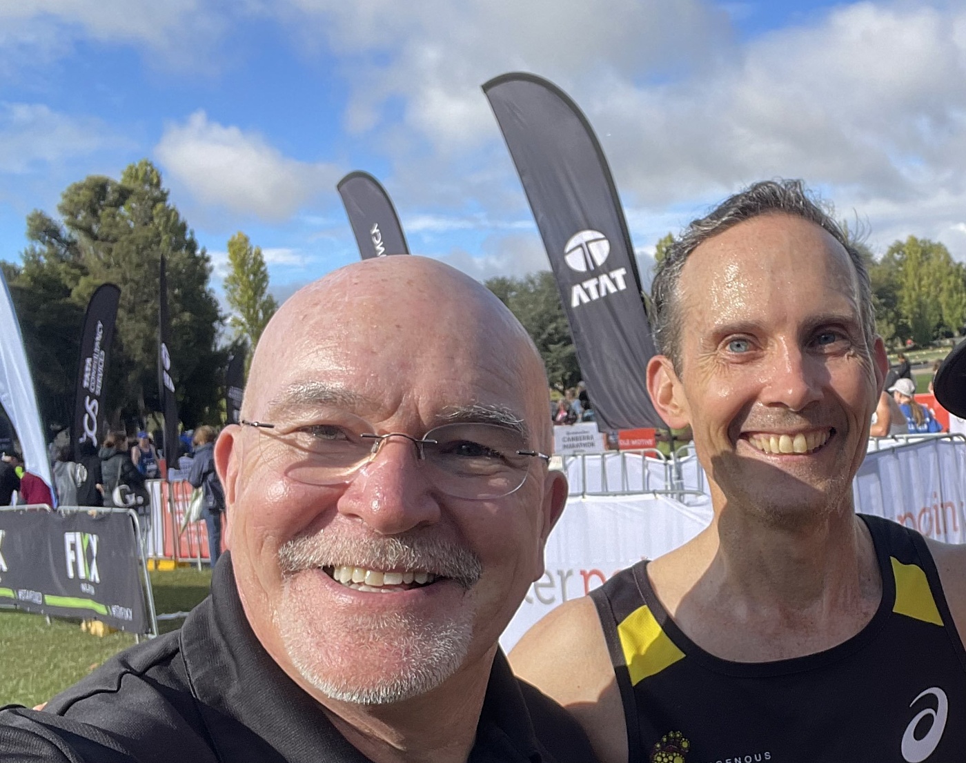 Deeks and Andrew Leigh at end of Canberra Marathon